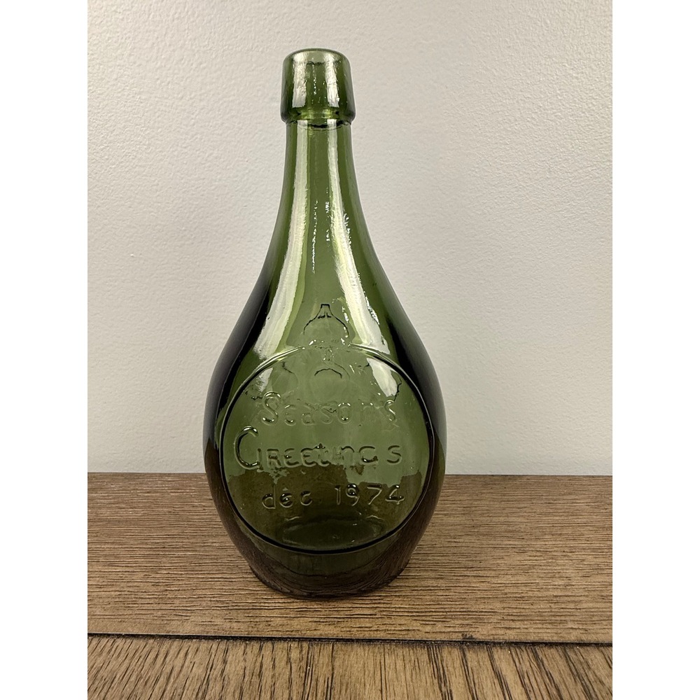 Vintage 1974 Seasons Greetings Green Glass Decanter Bottle Holiday decoration